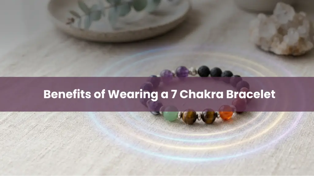 7 chakra bracelet with colorful beads on a wooden surface with glowing energy rings and text ‘Benefits of Wearing a 7 Chakra Bracelet.