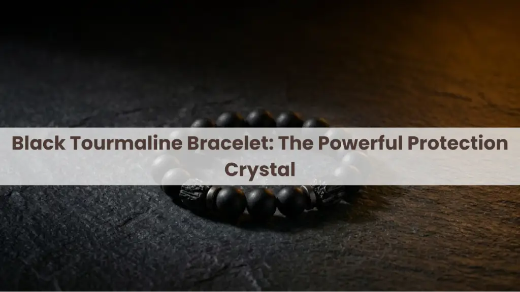 Black tourmaline bead bracelet on a dark wooden surface with the text “Black Tourmaline Bracelet: The Powerful Protection Crystal.