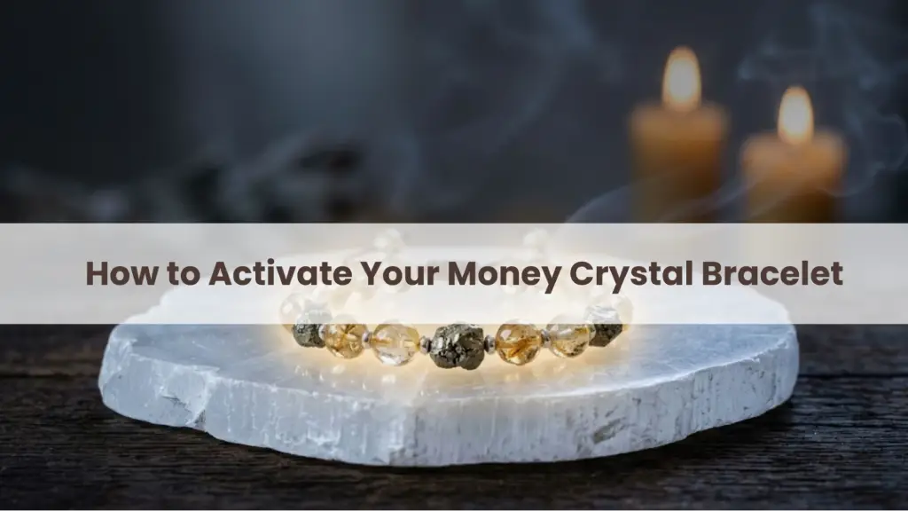 Money crystal bracelet placed on a selenite plate with candles for activation ritual. To get the best results: