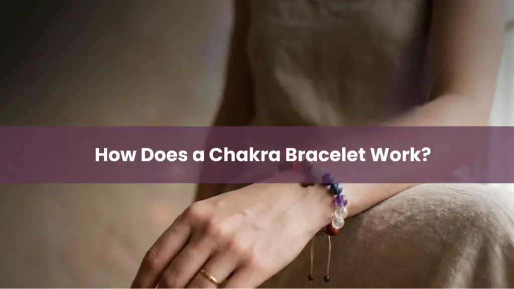 Person wearing a 7 chakra crystal bracelet with text ‘How Does a Chakra Bracelet Work?