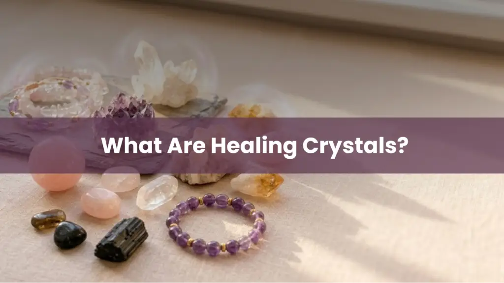 Various healing crystals and a crystal bracelet displayed with the title What Are Healing Crystals